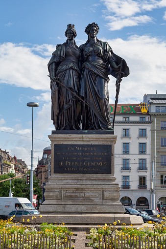 Geneva, Switzerland - June 11 2018: The National Monument created by Robert Dorier in 1869 represents Geneva and Helvetia.