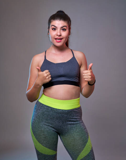 istock Plus size woman doing fitness exercises 1283667444