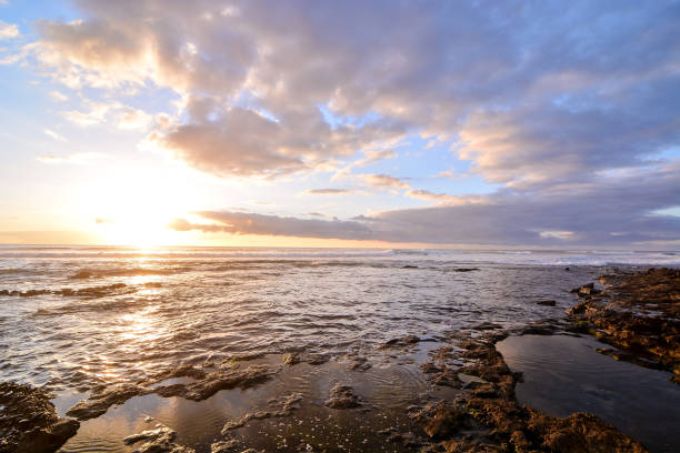 istock The Sun Setting in the Sea 1283668293