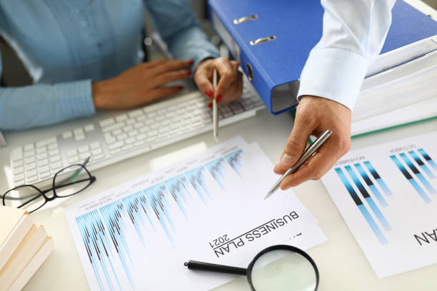 istock Drawing up and planning a business plan for 2021 closeup. 1283668711