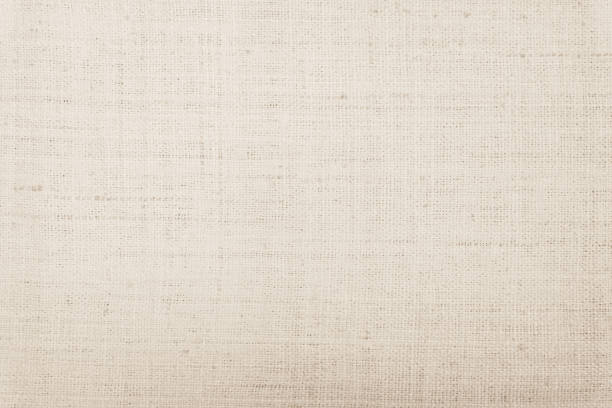 istock Brown Hemp rope texture background. Sackcloth or blanket wale linen wallpaper. Rustic sack canvas fabric texture in natural. Haircloth vintage linen burlap weaving, Old beige carpet background. 1283669743
