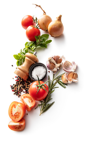Seasoning: Tomato, Garlic, Onion, Herbs, Salt  and Pepper Isolated on White Background