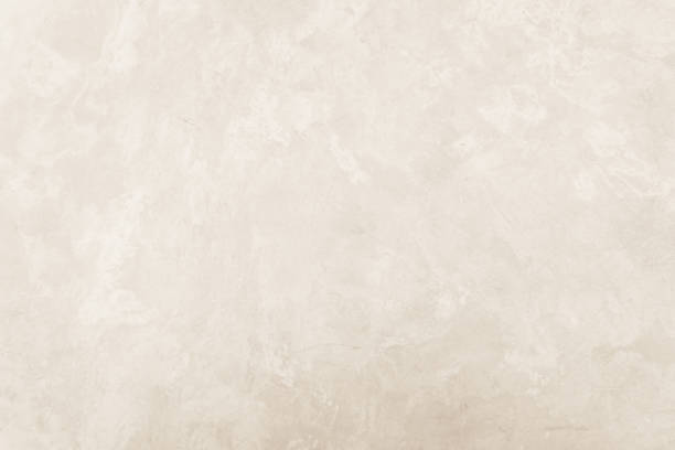 istock Cream concreted wall for interiors or outdoor exposed surface polished concrete. Cement have sand and stone of tone vintage, natural patterns old antique, design art work floor texture background. 1283672302