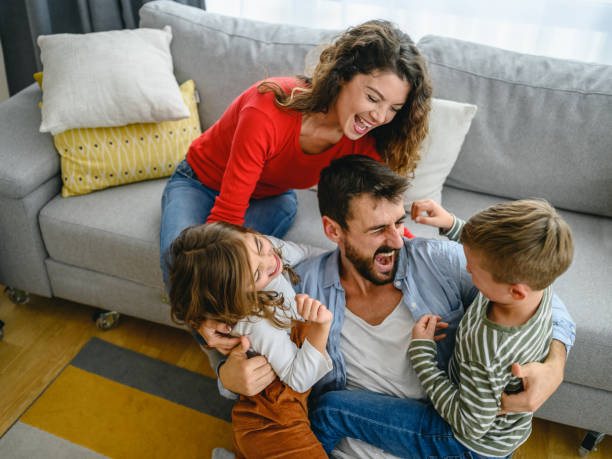 istock Happy family at home. 1283674941