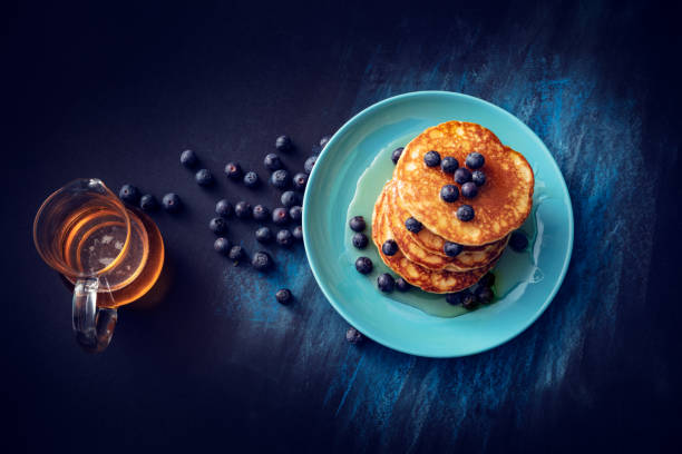 istock Breakfast: Pancakes, Syrup and Blueberries Still Life 1283675079