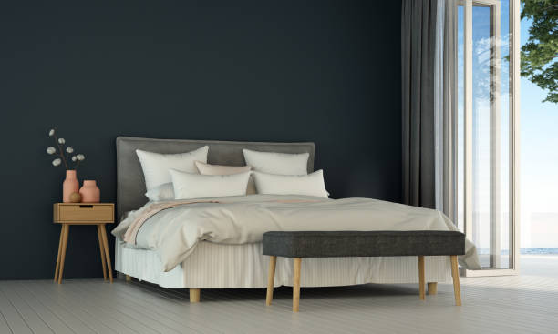 istock The modern bedroom interior design and blue wall texture background and sea view 1283676448