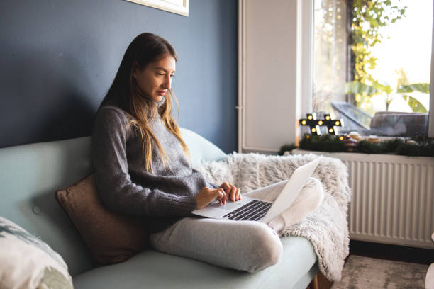 istock Young woman working from home 1283676926