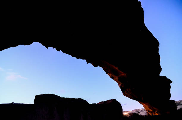 istock Natural Arch in the Desert 1283677535