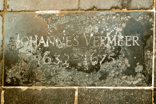 April 8, 2019 - Netherlands - Close-up of the tombstones of the Dutch artist Johannes Vermeer in the Old Church in Delft