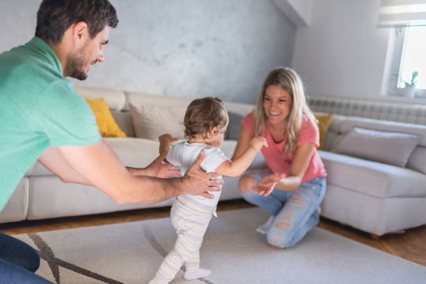 istock First steps of our baby 1283678176