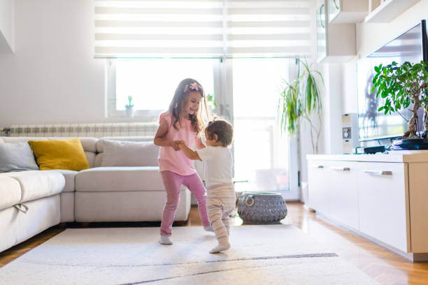 istock First steps of my sister 1283678879