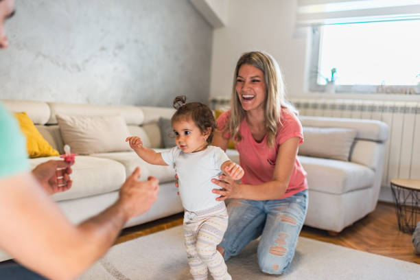istock First steps of our baby 1283680117
