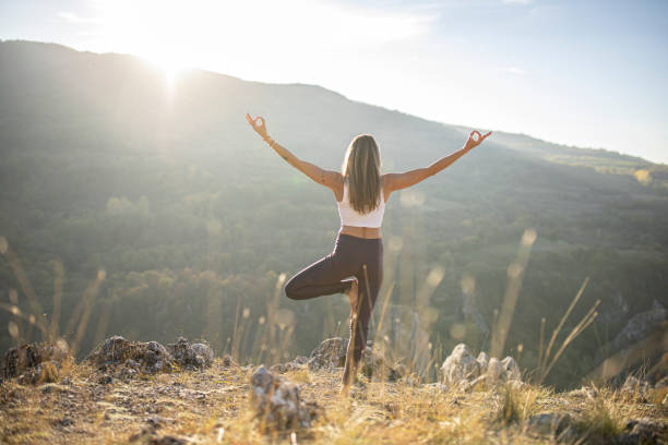 istock Morning yoga exercises in nature 1283680761