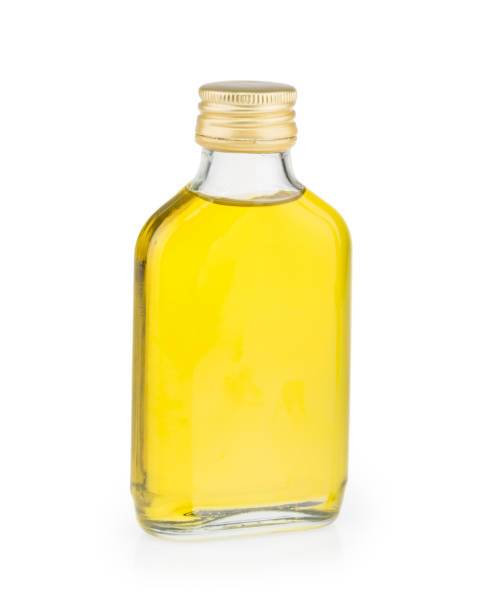 istock bottle with oil isolated on white background 1283680911