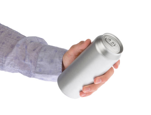 istock Hand holds metal beverage drink can isolated on white clipping path 1283681567