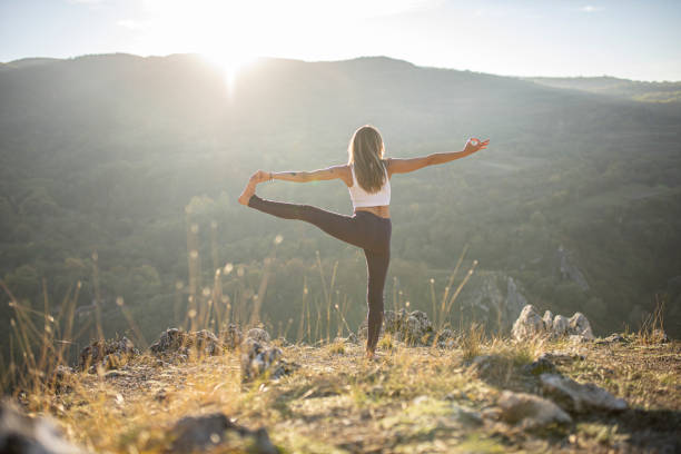 istock Morning yoga exercises in nature 1283681849