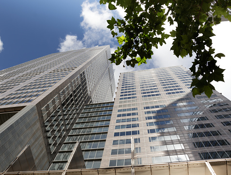 Details of mirror surface of skyscrapers reflecting the sky