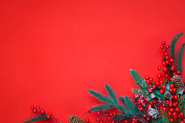 istock Christmas decorations on the red background with copy space for your text. 1283684064