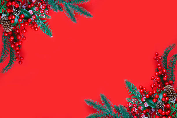 istock Christmas decorations on the red background with copy space for your text. 1283684119