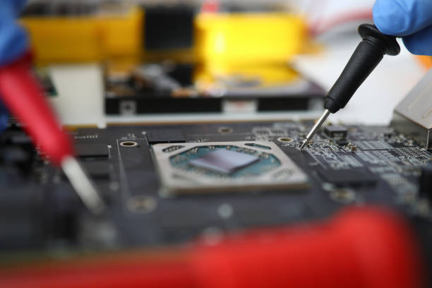 istock Master makes diagnostics of motherboard with tester. 1283684480