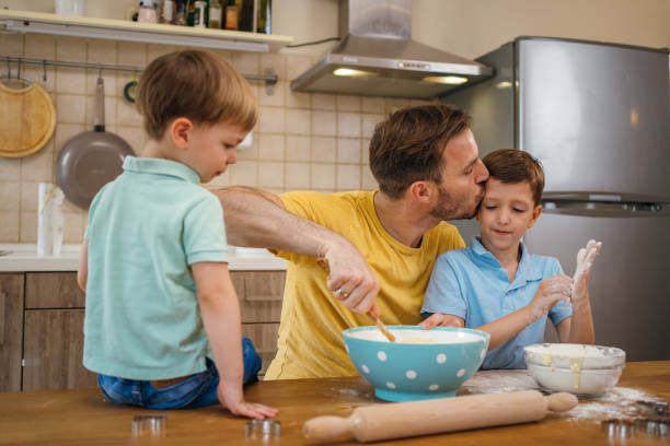istock Family making cookies together 1283684594