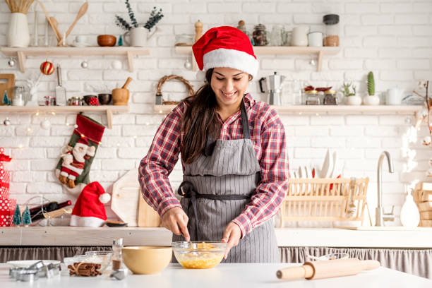 istock Young latin woman whisking eggs cooking at the kitchen 1283684639