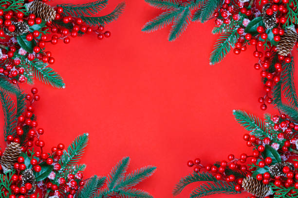 istock Christmas ornament on the red background. Top view with copy space for your text. 1283685566