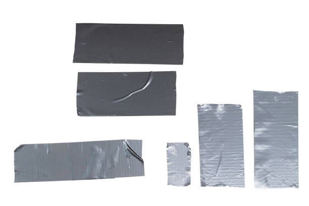 istock Silver scotch tape pieces isolated on white background. 1283685777