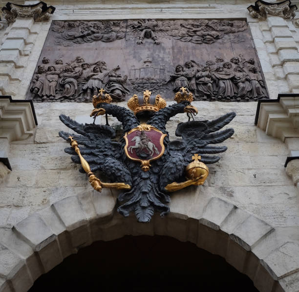 istock Double eagle with scepter and orb - State Emblem of tsarist Russia Sculpture placed in the Peter and Paul fortress in Saint-Petersburg, Russia 1283685967