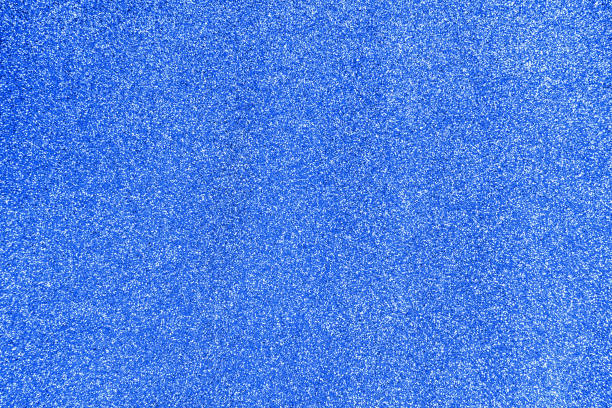 istock Blue glitter background and texture. Christmas and holiday background 1283686010