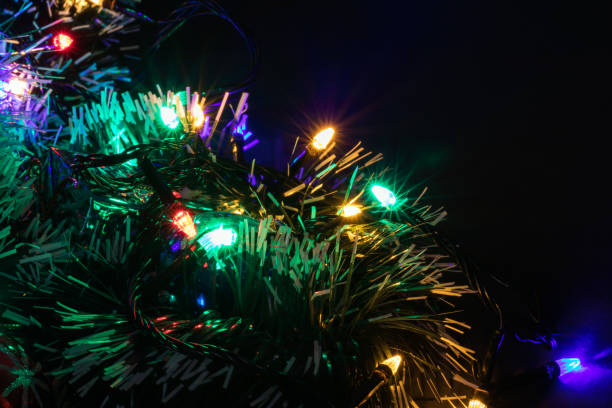 istock Christmas Holiday Background, Christmas table background with decorated Christmas tree and garlands. 1283687255