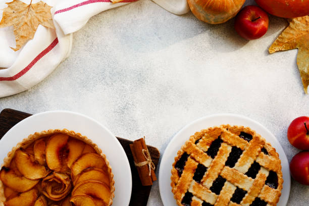 istock Apple pie and berry tart pie autumn composition 1283687648