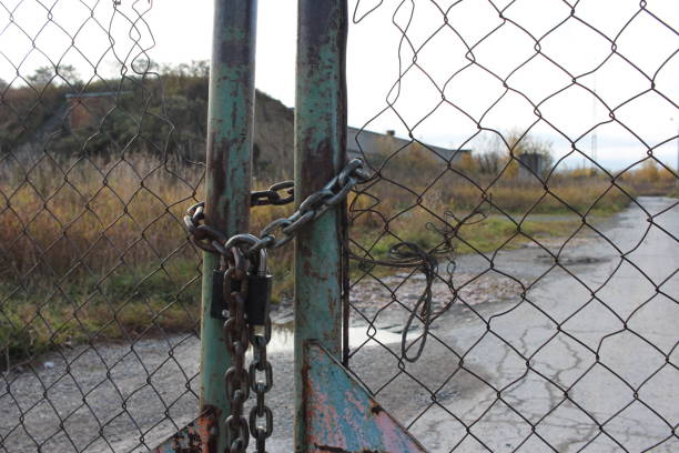 master key and old rusty chain with Steel cage.