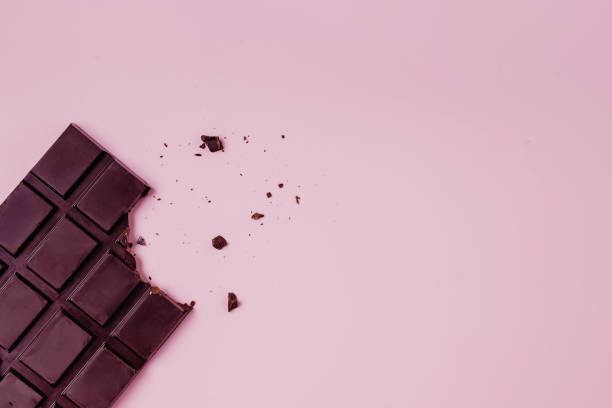 istock Bited bar of chocolate with crumbs 1283695102