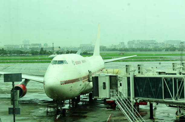 istock Jet bridge connects the airplane door 1283697272
