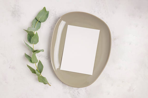 istock Blank paper card mock-up in minimal style. 1283699093