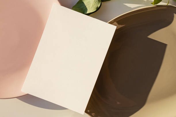 istock Blank paper card mock-up in minimal style. 1283699097