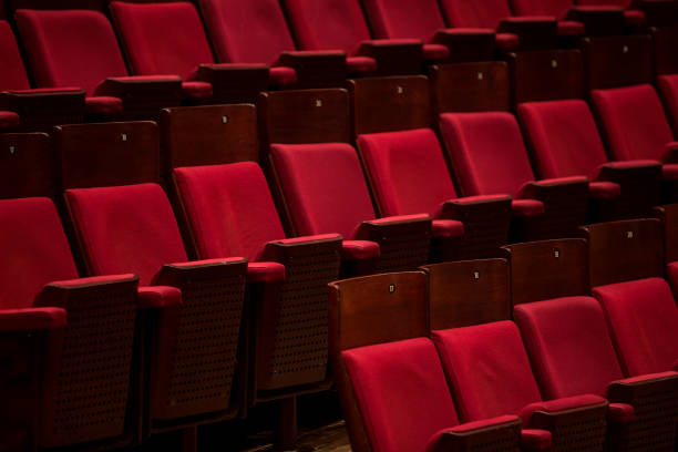 Empty concert hall with red chairs Empty concert hall with red chairs concert hall photos stock pictures, royalty-free photos & images