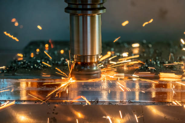 istock The burning chip from CNC milling machine rough cutting  by index-able  end-mill tools. 1283699619