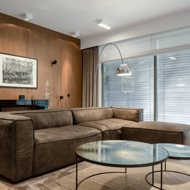 istock Stylish living room with lights on 1283705793