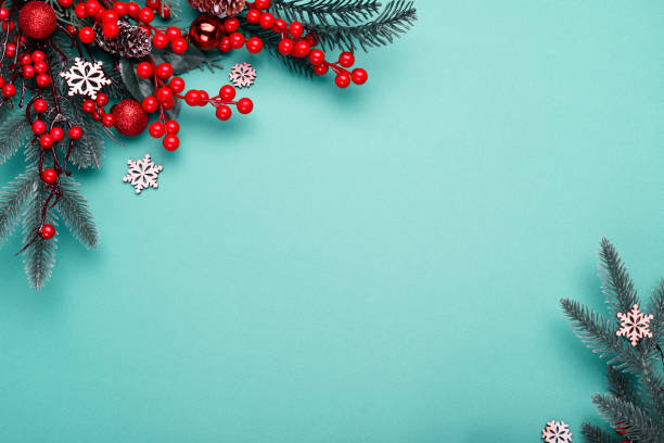 istock Christmas ornament on the red background. Top view with copy space for your text. 1283707170