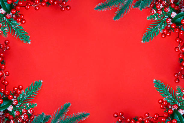 istock Christmas ornament on the red background. Top view with copy space for your text. 1283707171