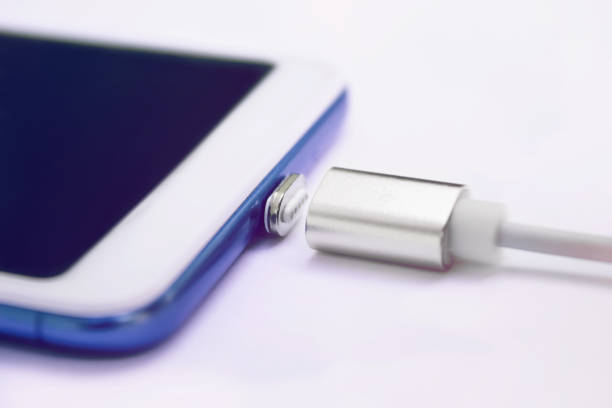 istock macro technology, charger to charge a smart phone 1283707411