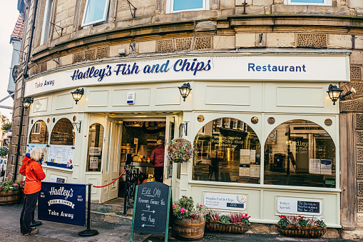 Hadley's Fish Restaurant on the corner of Bridge Street and Church Street in the coastal town of Whitby in the North Yorkshire region of England.
