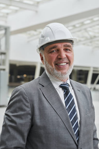 istock Senior Businessman at Construction Site 1283713577