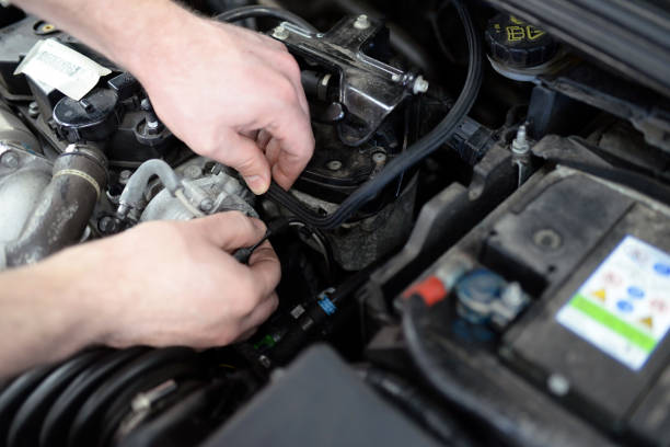 istock job and workplace - mechanic in a workshop repairing a car 1283713793