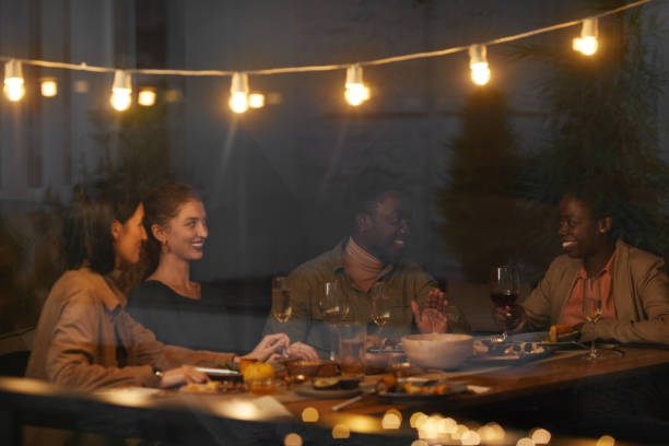 Friends Enjoying Dinner Outdoors