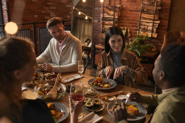 istock Adult People Enjoying Dinner Party 1283716741