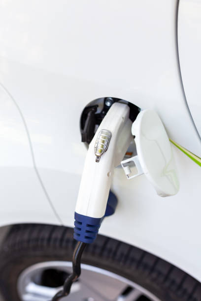 istock Electric car battery charging at charge station 1283716772
