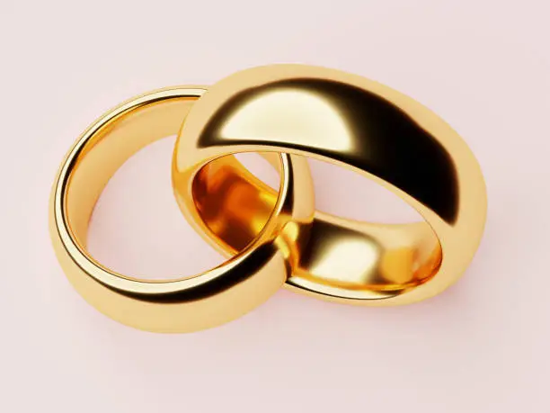 Two wedding gold rings lie in each other. Love concept. 3d rendering